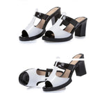 Black and white slipper sandals